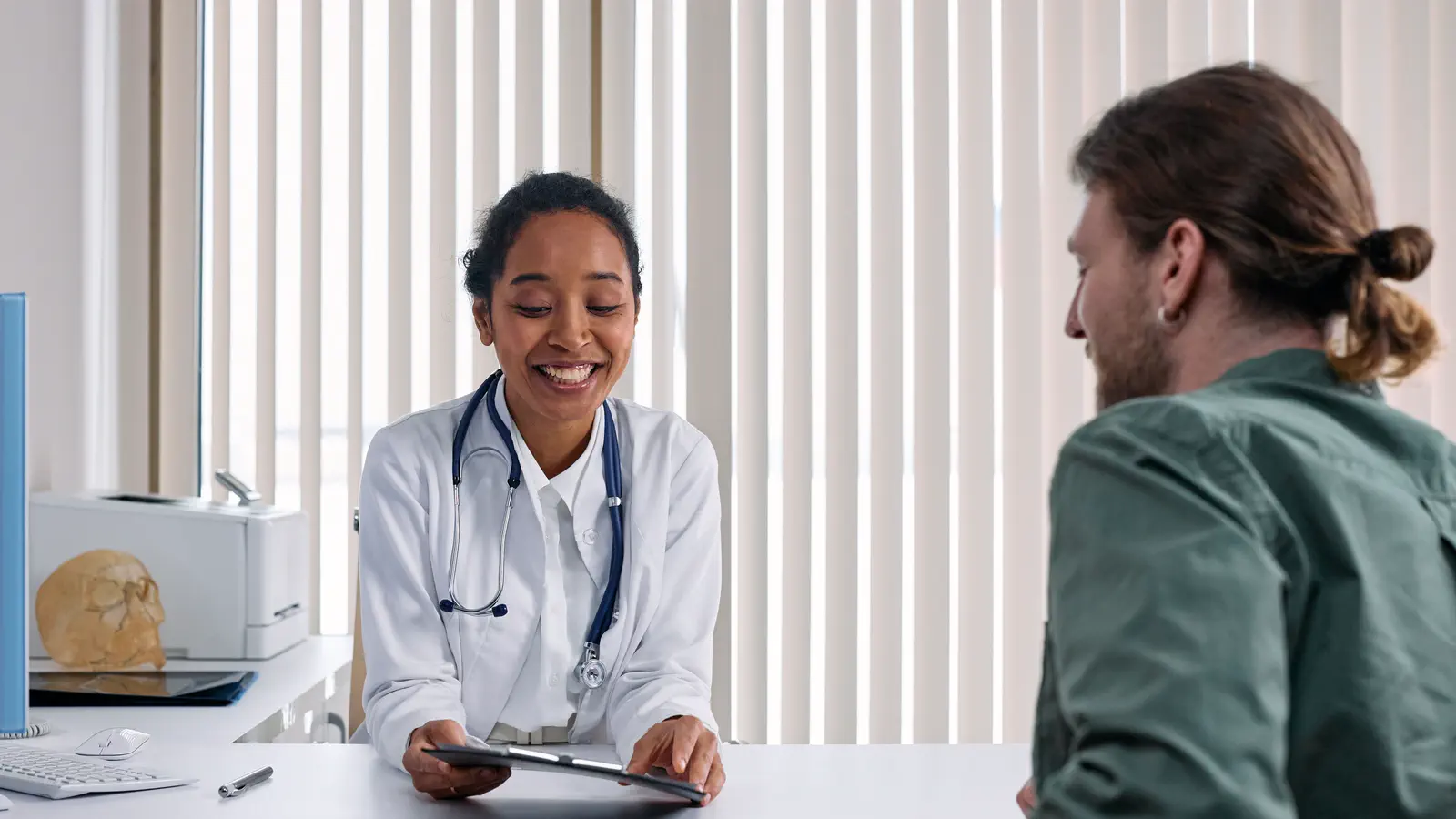 Clinician and patient discussing a testosterone treatment plan